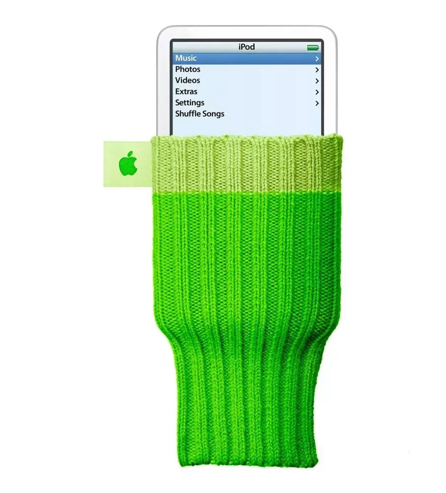 A white iPod partially inside a bright green knitted sock-like case with a small Apple logo tag on the side. The iPod screen displays a menu with options like Music, Photos, Videos, Extras, Settings, and Shuffle Songs.